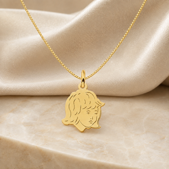 Kleine gouden meisjeshanger met kinderkopje en gravure