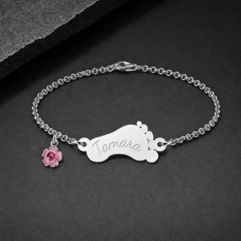 Zilveren baby armband met voetje