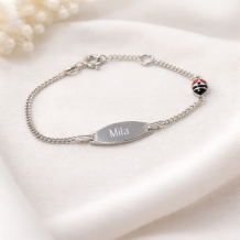 Zilveren kinderarmbandje met lieveheersbeestje rood