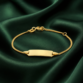 Gouden plaatarmband met figaro schakelbandje en uitgesneden hartje